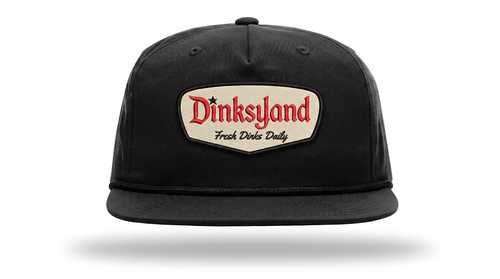Heritage — Black Richardson 256 rope cap with black rope and a cream embroidered Dinksyland patch with a black border.